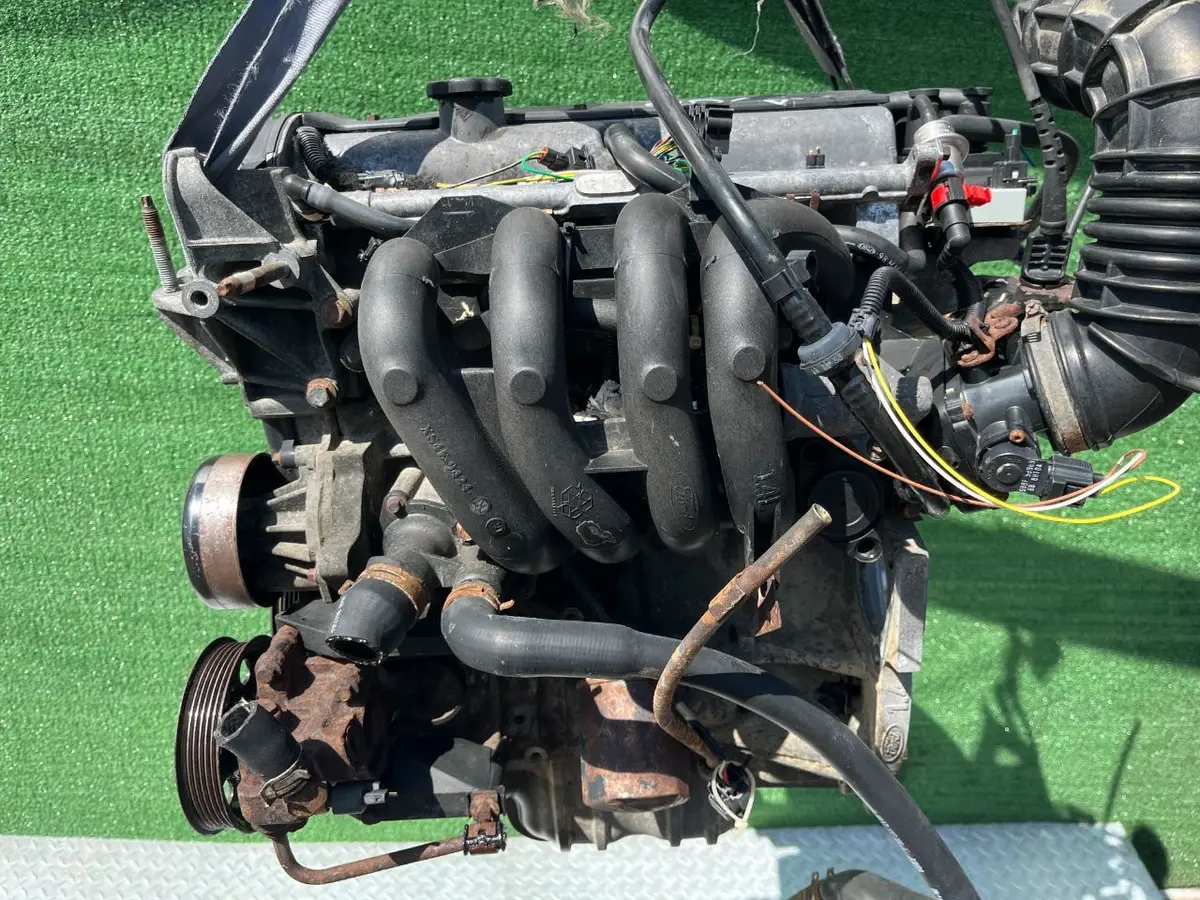 Двигатель Ford Focus 1.4л 2000 — фото 2